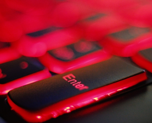 a close up of a red and black keyboard